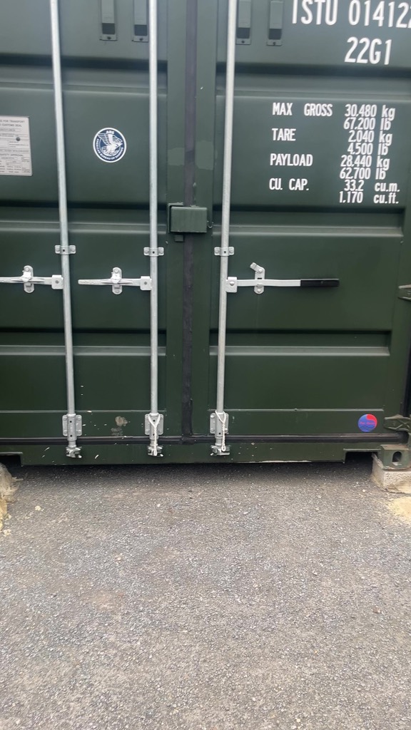 Doors of a one-trip container