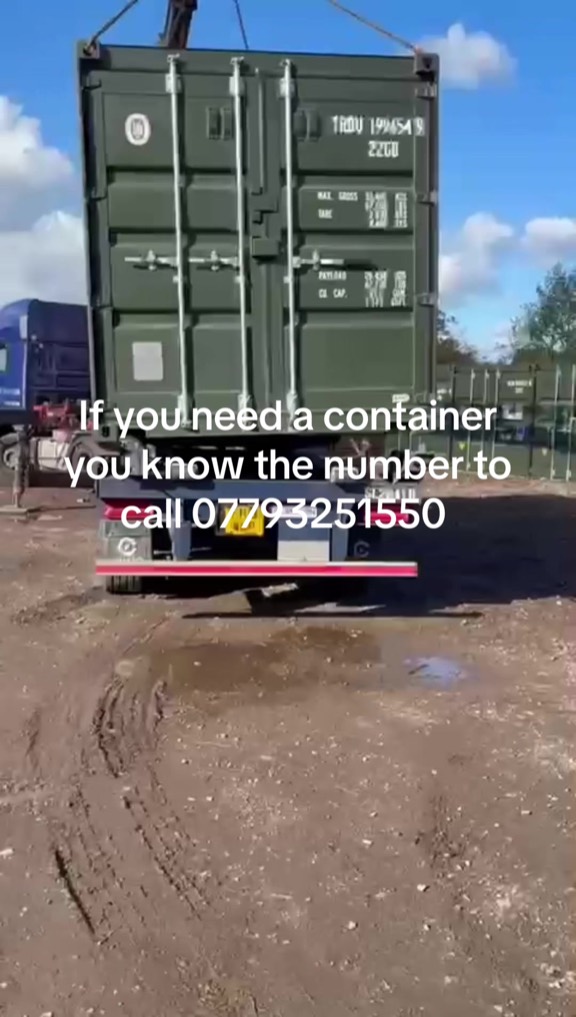 Container being lifted during a delivery